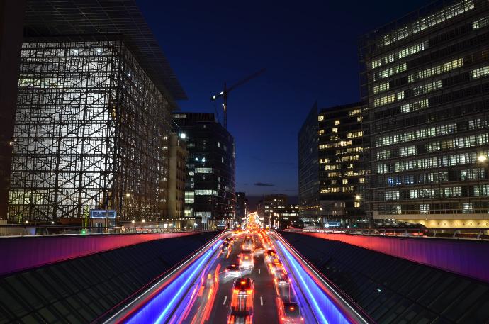 time-lapse photography of vehicle on road during night time